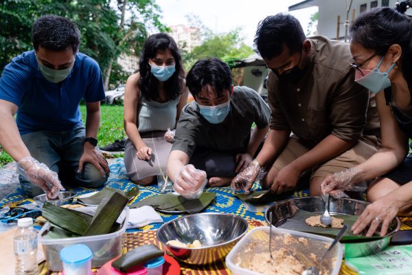 Guests trying to make Asli desserts the old-school way